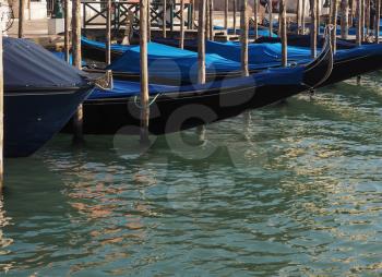 Gondola traditional flat bottomed rowing boat in the Venetian lagoon in Venice, Italy