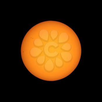 the Sun seen with telescope from planet Earth, with sunspots visible as dark spots compared to surrounding regions