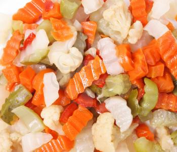 Mixed vegetables as used in Russian Salad including carrots turnips courgettes zucchini cauliflower peppers celery onions olives