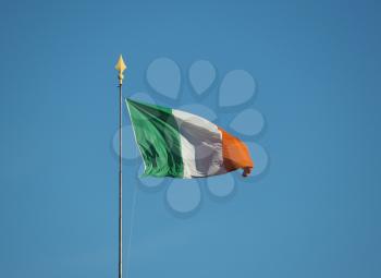 the Irish national flag of Ireland, Europe over blue sky