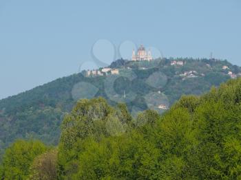 View of the hills surrounding the city of Turin, Italy with the Basilica di Superga baroque church on top of the hill