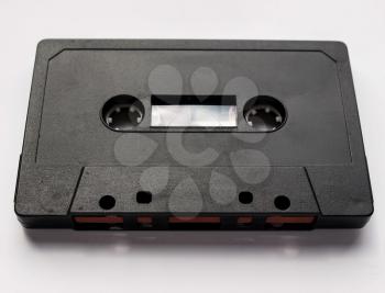 Black magnetic tape cassette for analog audio music recording
