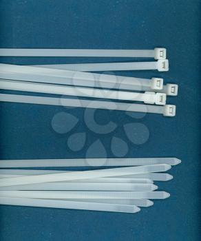 white electric cable ties (aka hose tie or zip tie)