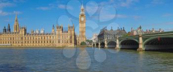 High resolution panoramic view of the Houses of Parliament Big Ben and Westminster Bridge seen from river Thames in London, UK