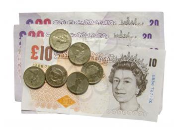 Detail of British Pound coins banknotes money