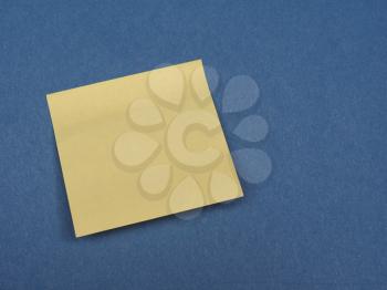 Post it over blue background with copy space