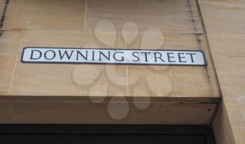 Downing Street sign on a wall in England