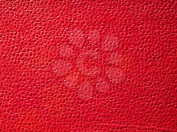 Red leatherette texture useful as a background