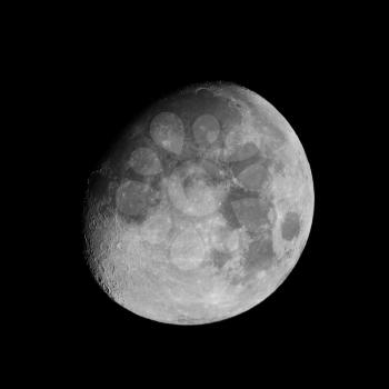 Moon almost full seen from the northern hemisphere with a telescope - black and white