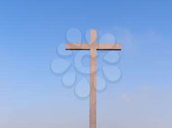 A Cross over a blue sky background
