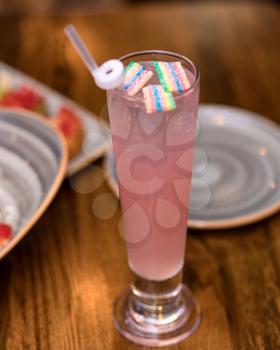 Tasty marshmallow juice cocktail on the table