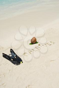 Royalty Free Photo of a Maldives Note Written on a Beach