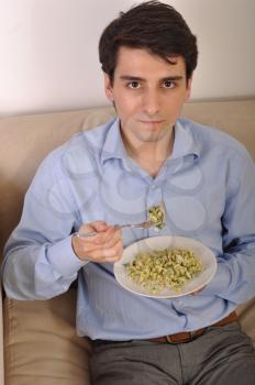 Royalty Free Photo of a Man Eating Lunch