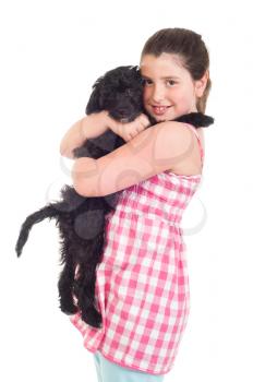 Royalty Free Photo of a Girl Holding Her Dog