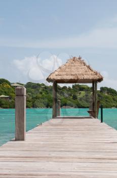 Royalty Free Photo of a Hut Over Sea in Long Bay, Antigua