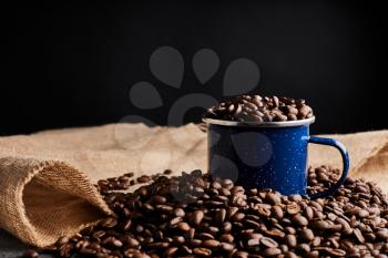 close up of coffee beans in a cup