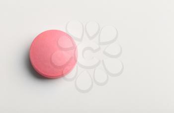 Colorful pill on white background�