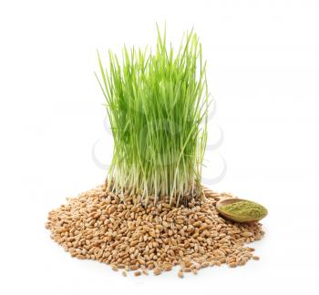 Fresh wheat grass with powder and seeds on white background�