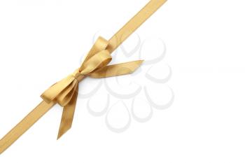 Golden ribbon with bow on white background�