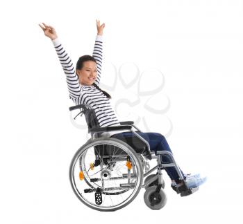 Happy Asian woman in wheelchair on white background�