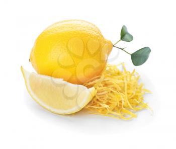 Ripe lemon with zest on white background�