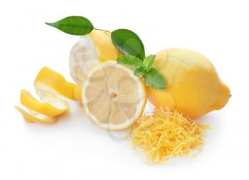 Ripe lemons with zest on white background�
