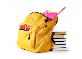 Backpack with school supplies on white background�