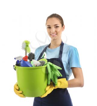 Woman with cleaning supplies on white background�