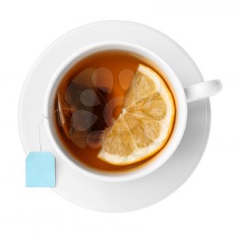 Cup of hot tea with lemon on white background�