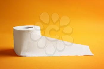 Roll of toilet paper on color background�