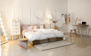 Interior of beautiful modern bedroom�