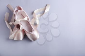 Ballet shoes on grey background�