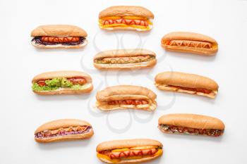 Tasty hot dogs on white background�