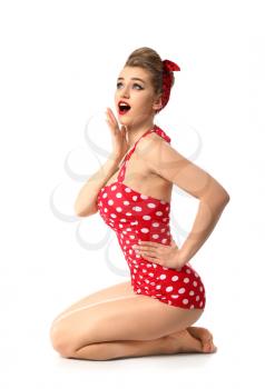 Surprised pin-up woman on white background�