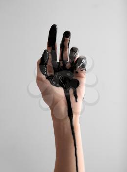 Painted hand on light background�