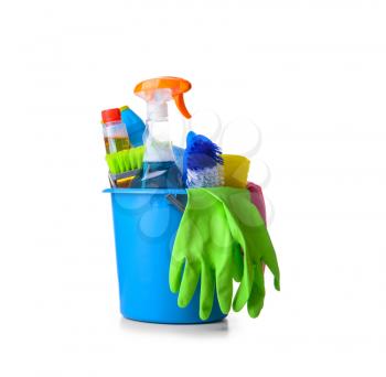 Set of cleaning supplies on white background�