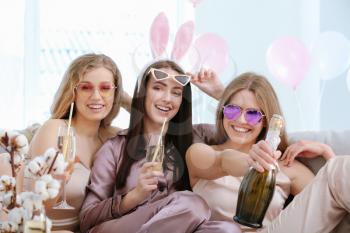 Beautiful young women drinking champagne at hen party�