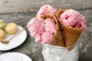 Tasty ice cream on grey table, closeup�