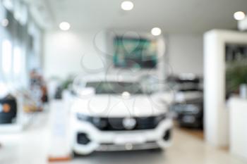 Blurred interior of modern car showroom�