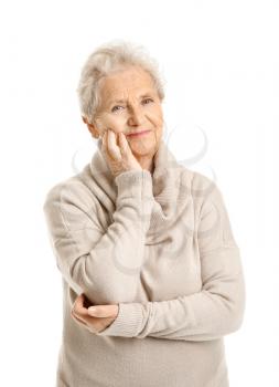 Portrait of senior woman on white background�