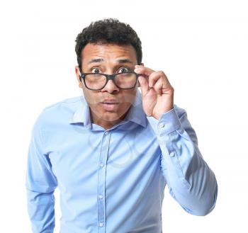 Portrait of shocked businessman on white background�