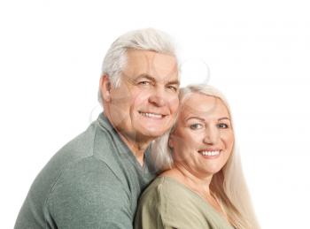 Portrait of happy mature couple on white background�
