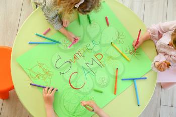 Little children during art lesson in summer camp�