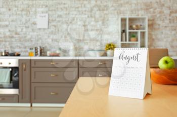 Flip calendar on table in kitchen�