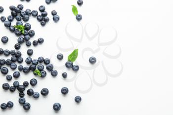 Many ripe blueberry on white background�