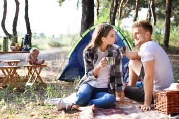 Young couple spending weekend in forest�