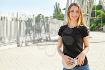 Woman in stylish t-shirt outdoors�