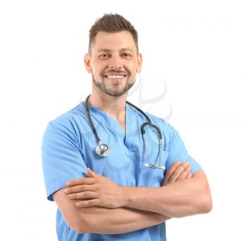 Male nurse with stethoscope on white background�
