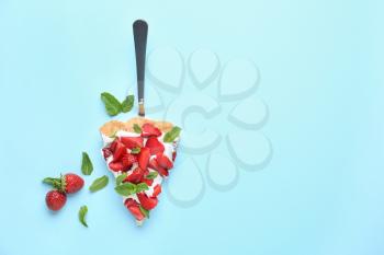 Piece of tasty strawberry cake on color background�