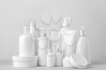 Set of cosmetic products on light background�